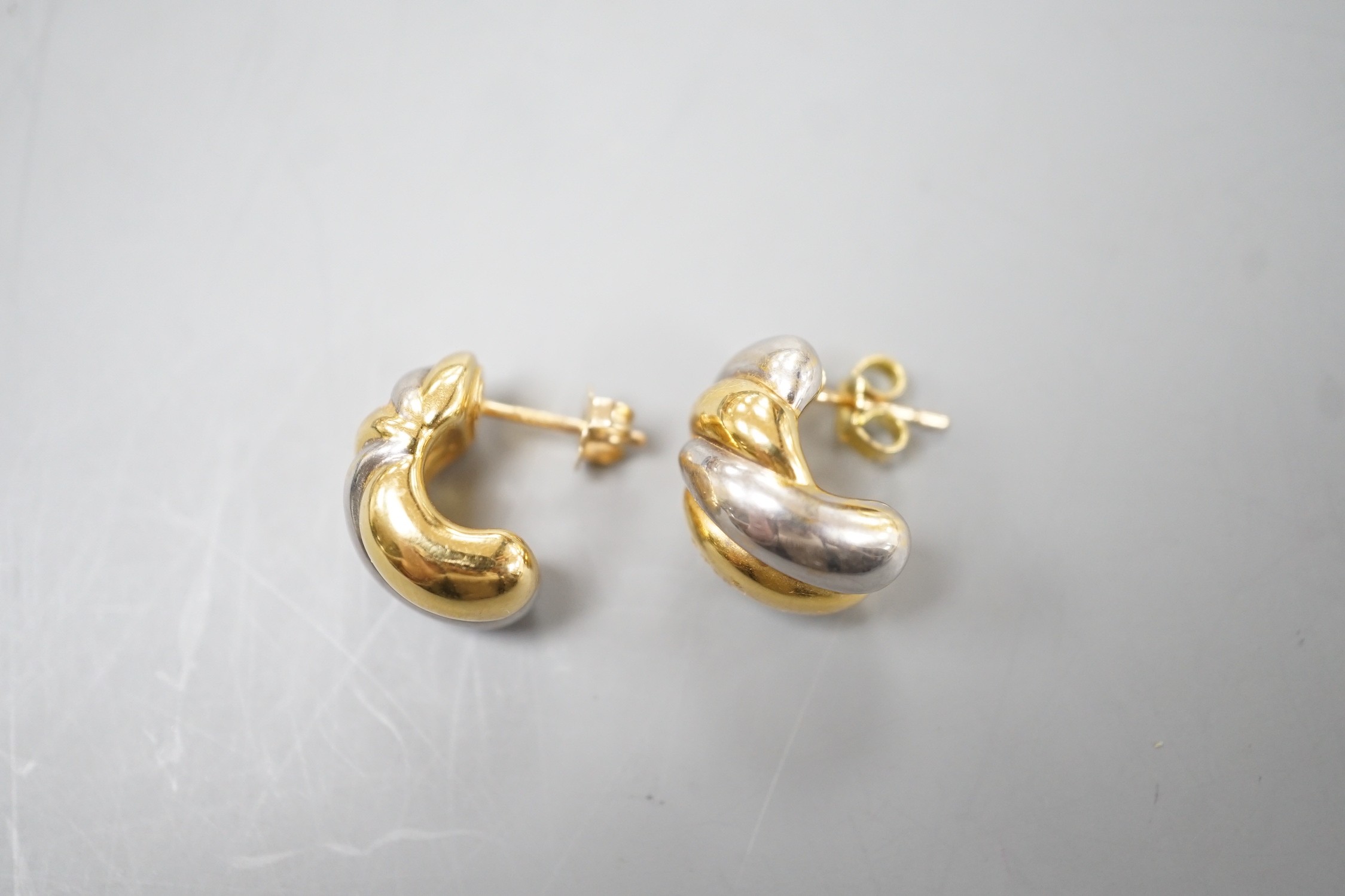 A modern pair of two colour 750 yellow metal demi lune earrings 15mm, 2.8 grams.